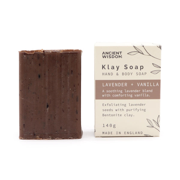 Klay Soap - Lavender & Vanilla. A rectangular bar of natural, light purple-coloured soap with visible lavender seeds for gentle exfoliation. The soap is infused with Bentonite clay for deep cleansing and has a soothing lavender and vanilla scent.