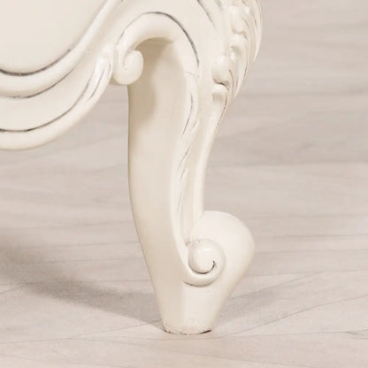 Ornate white furniture leg showcasing the elegance of a 3ft single bed design