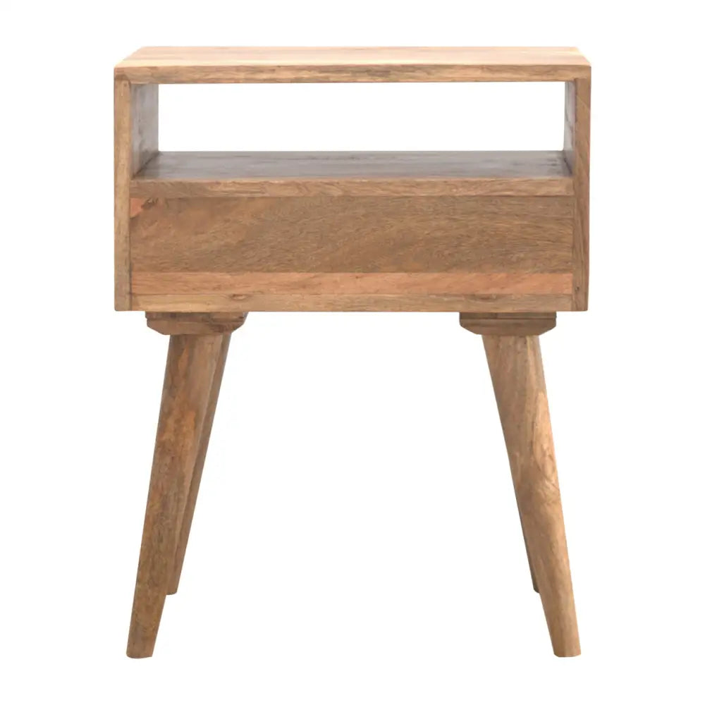 Solid Mango Wood Nightstand with tapered legs and stunning oak-ish hue in cozy setting