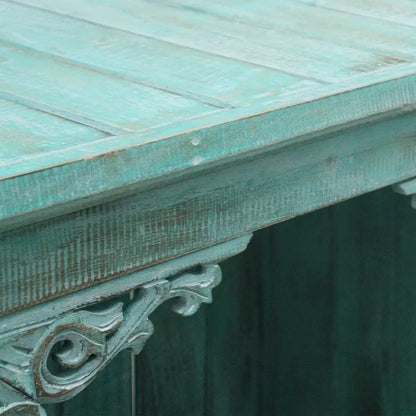 Weathered turquoise wooden table with ornate bracket in Rustic Bathroom Cabinets design