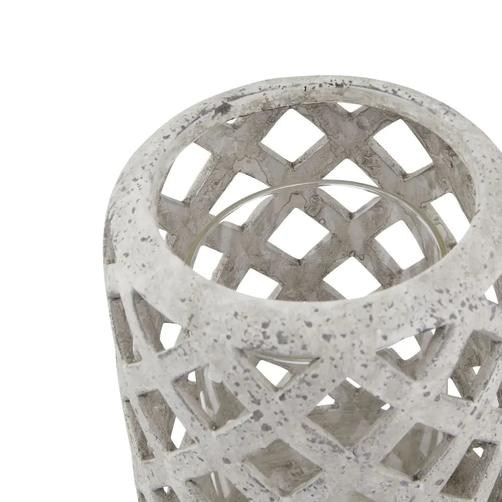 Decorative grey stone effect hurricane lantern with a cool openwork lattice pattern