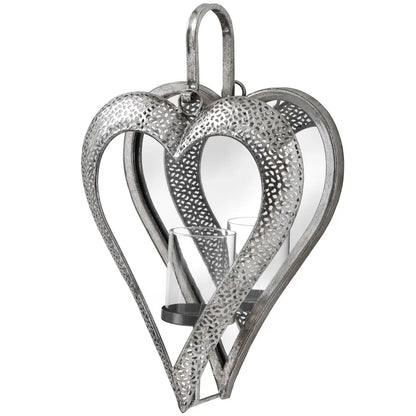 Heart-shaped antique silver tealight holder with textured openwork design