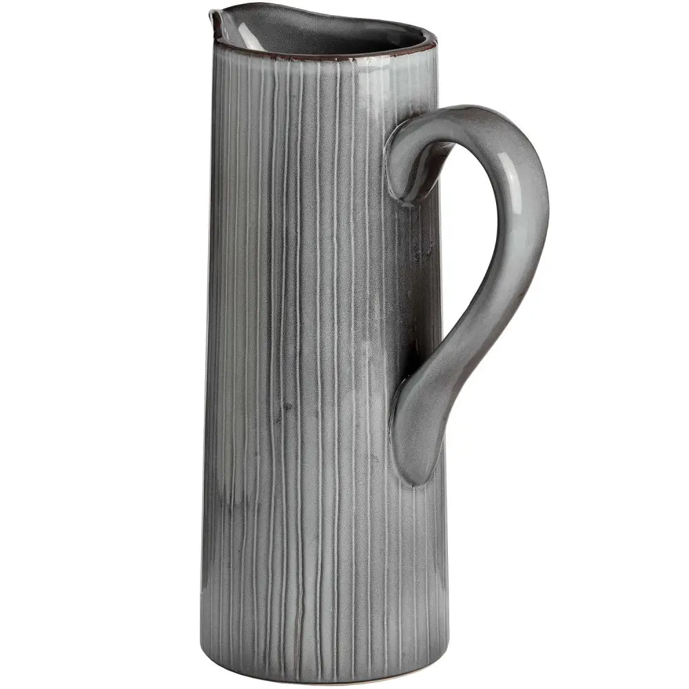 Tall silver pitcher with ribbed design, perfect for the Elegant Grey Ceramic Display Jug