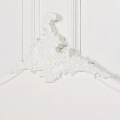 Ornate floral plaster molding on a Hand-Painted Cream 5ft King Size Headboard corner