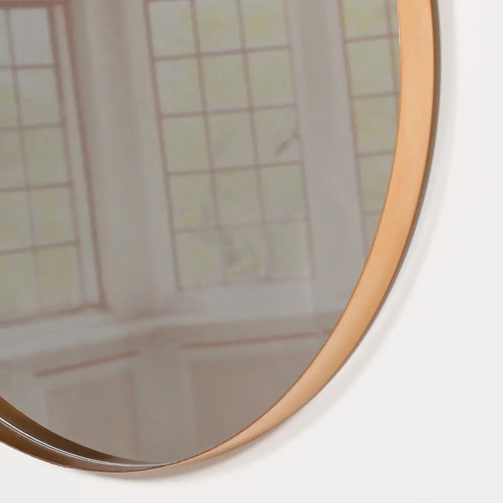 Circular mirror with a thin copper frame for the 50cm gold round wall mirror