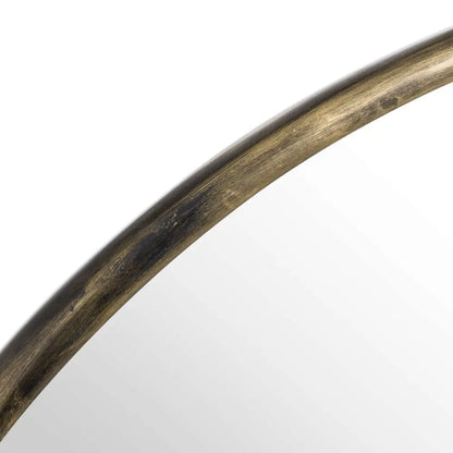 Curved metal rod with a weathered brass look from the Antique Brass Large Narrow Edged Mirror