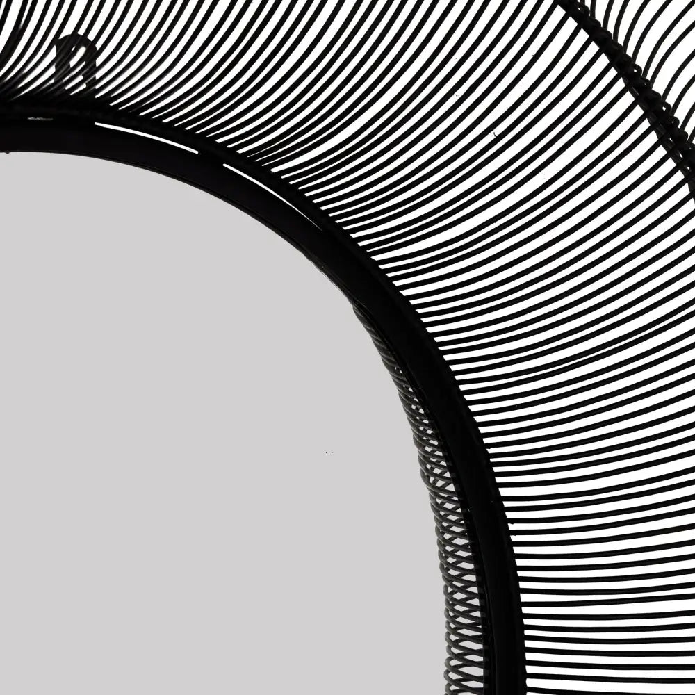 Chico Black Large Wire Mirror featuring a circular abstract design in black and white