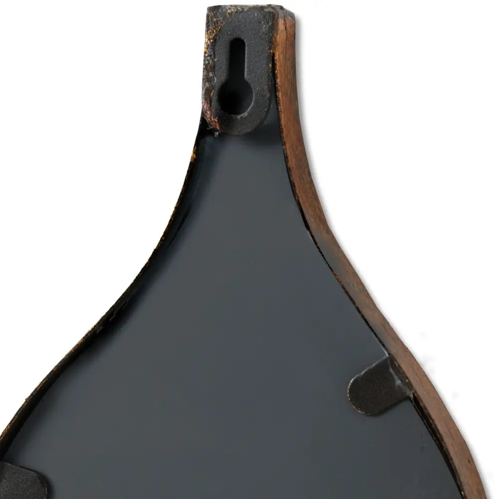 Black paddle-shaped object with wood edge for Chic Home mirror decor, perfect for candles