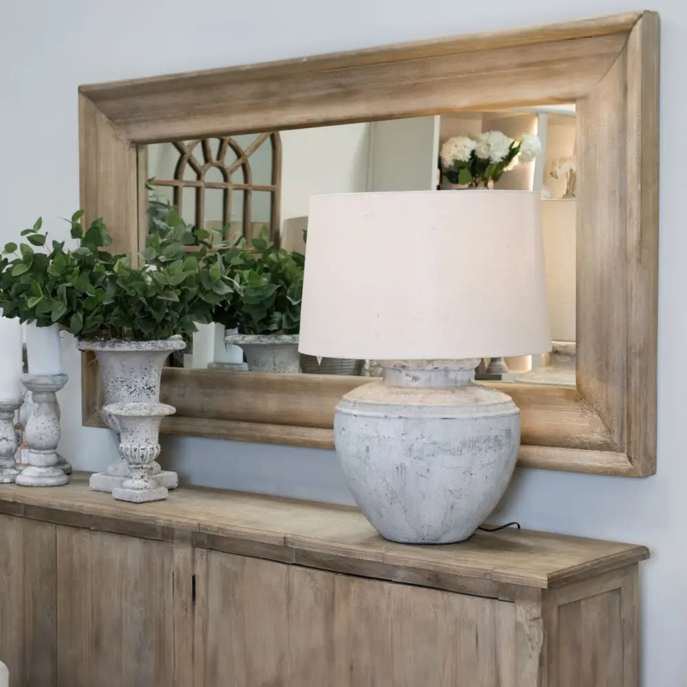 Rustic Wooden Frame Mirror from the Copgrove Collection above a stylish console table