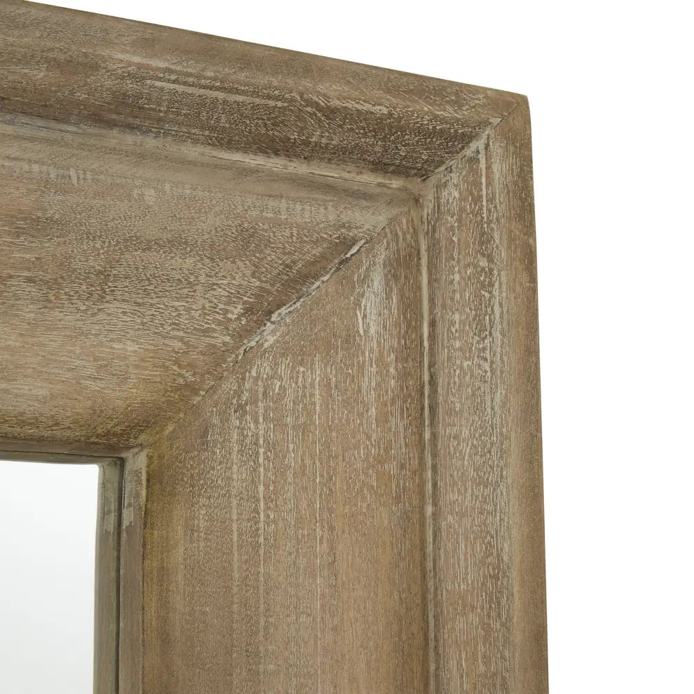 Weathered wooden frame corner showcasing rustic finish from the Copgrove Collection