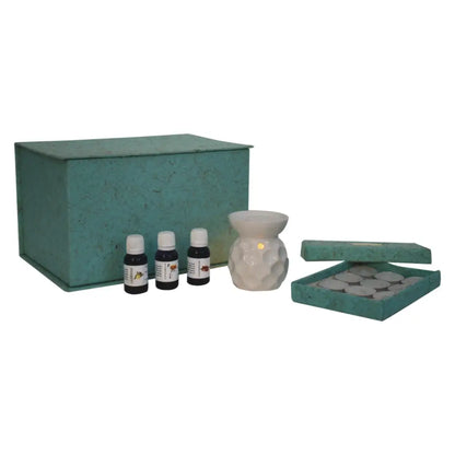 Aromatherapy gift set featuring Taya White Oil, diffuser, bottles, and two wax melts