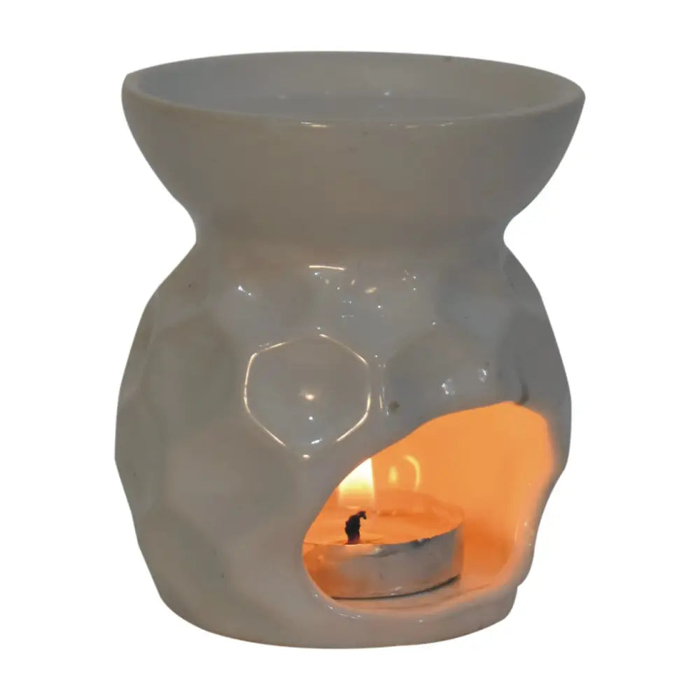 Ceramic Taya White Oil Burner with heart cutout and two wax melts for a cozy vibe