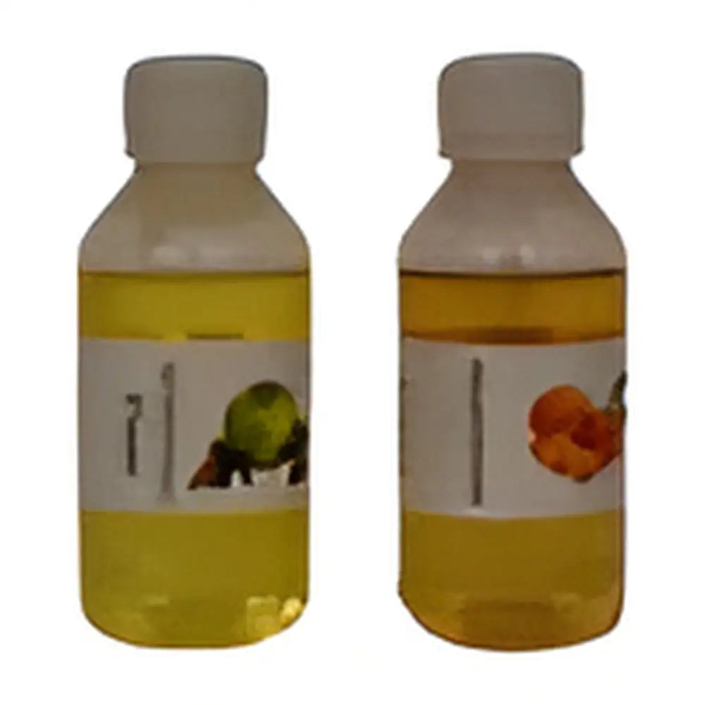 Two plastic bottles with yellow liquid and fruit labels from Eco-Friendly Reed Diffuser