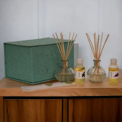 Green fabric storage box for the Amia Diffuser Set with Lavender & Oudh scents