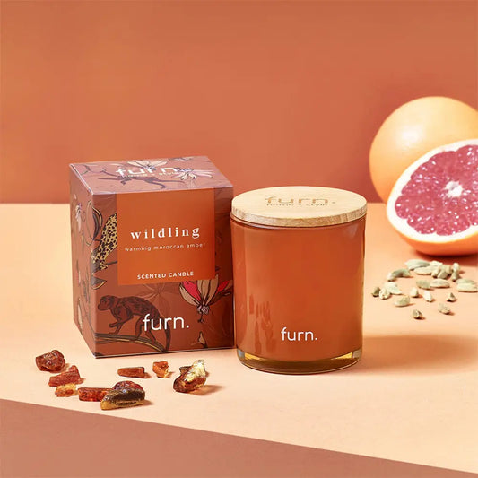 Scented glass candle in orange jar, Wildlings Amber with mandarin scent for 40-hour burn