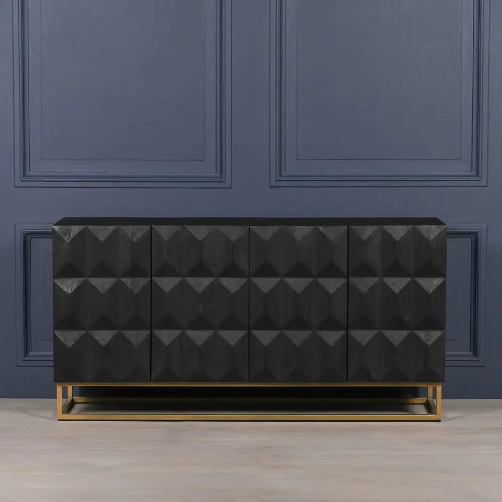 Dark textured sideboard with geometric patterns on a gold-toned base.