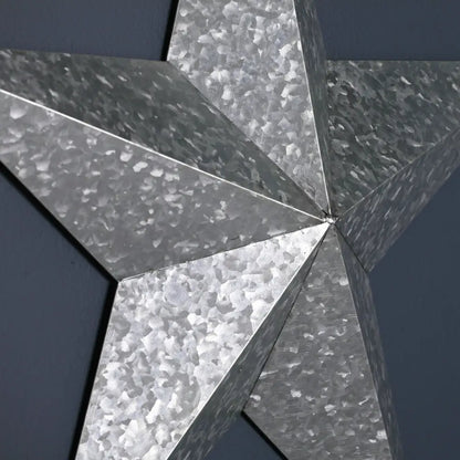 Stunning large metal decorative wall star with a textured, hammered design