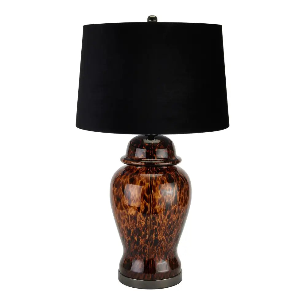 Amber Dapple Acanthus Lamp featuring a tortoiseshell base and black fabric shade