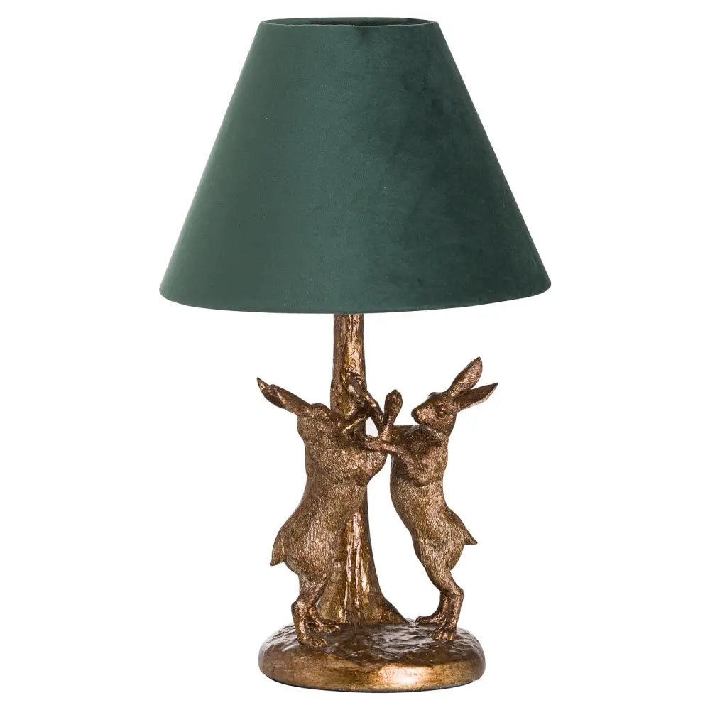 Table lamp with bronze hares base and green velvet shade for a chic vintage vibe