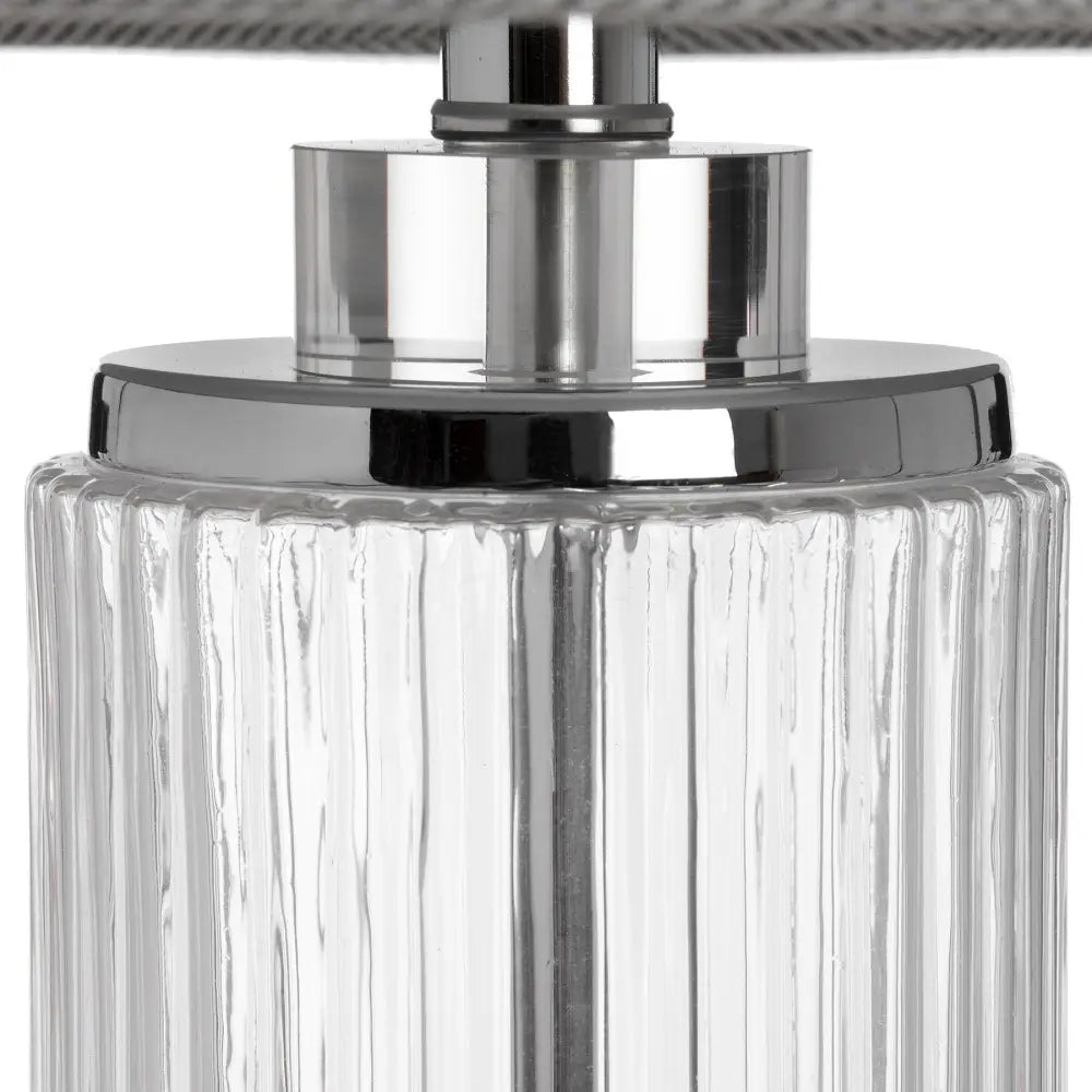 Stylish Roma Glass Table Lamp featuring a ribbed glass bottle and silver cap